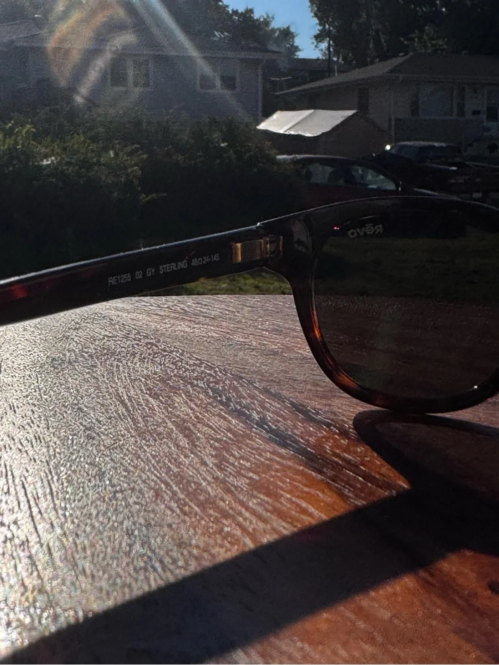 RE1255 02 GY Revo Sterling Tortoiseshell Frame Polarized Lenses Like NEW
